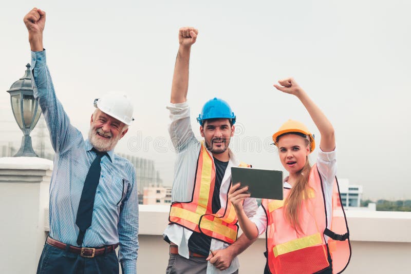Portrait of engineering teamwork are showing hands up after business successful, Construction teamwork concept royalty free stock photography Portrait of engineering teamwork are showing hands up after business successful, Construction teamwork concept royalty free stock photography