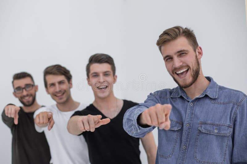 Young group of cheerful students pointing at you. stock photo Young group of cheerful students pointing at you. stock photo