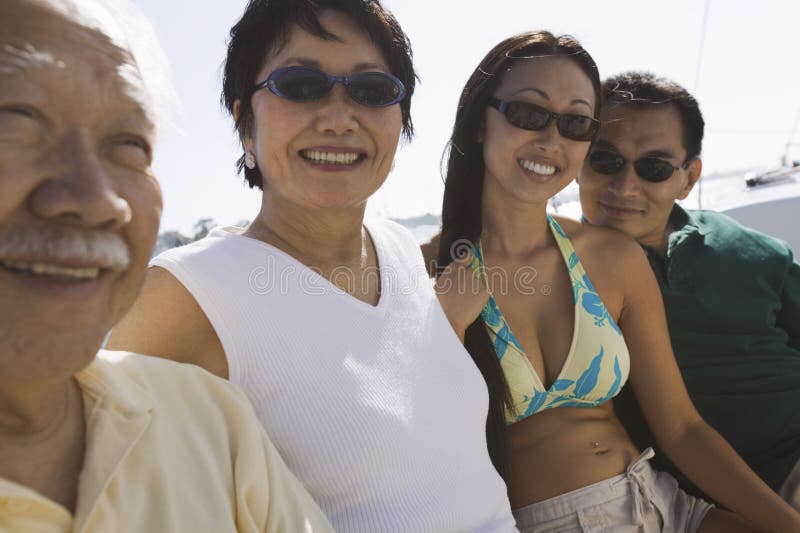 Portrait Of A Family In Boat