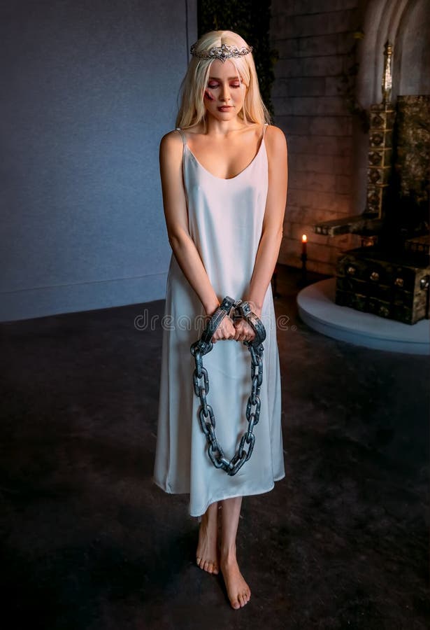 Attractive Young Woman Shackled In Chains Stock Photo, Picture and Royalty  Free Image. Image 5202772.