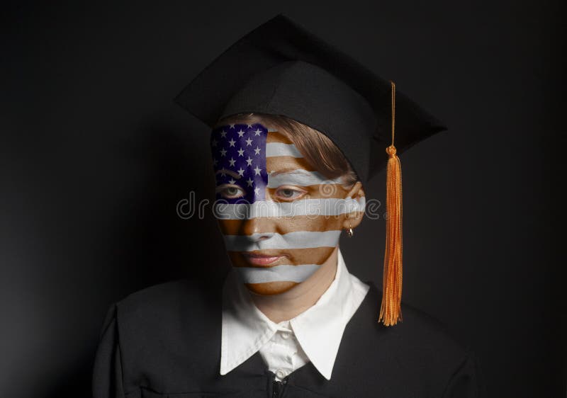 Portrait of Female American bachelor with painted USA Flag in Black mantle and Graduation Cap stock images Portrait of Female American bachelor with painted USA Flag in Black mantle and Graduation Cap stock images
