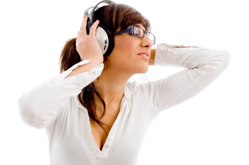 Portrait of female listening music