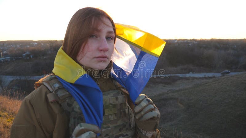 Portrait of Female Ukrainian Army Soldier Looking into Camera with Sad ...