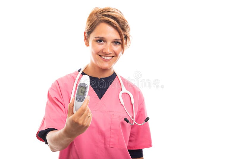 Portrait of female vet wearing pink scrub showing digital thermometer. royalty free stock image Portrait of female vet wearing pink scrub showing digital thermometer. royalty free stock image