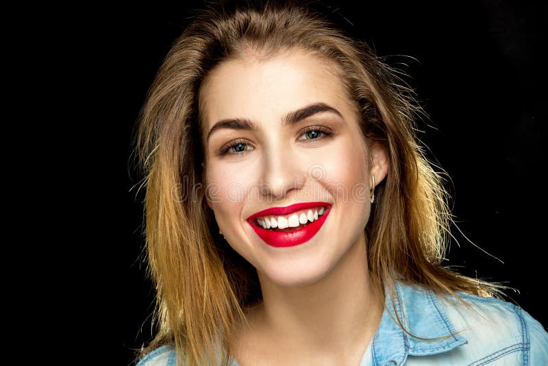 Portrait of fun young woman with beautiful makeup.
