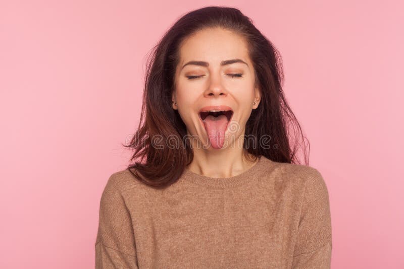 Portrait Of Funny Disobedient Young Woman With Brunette Hair Keeping Eyes Closed And 