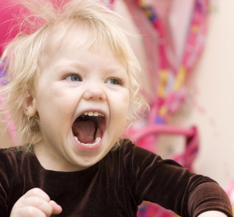 Portrait of a funny little girl.