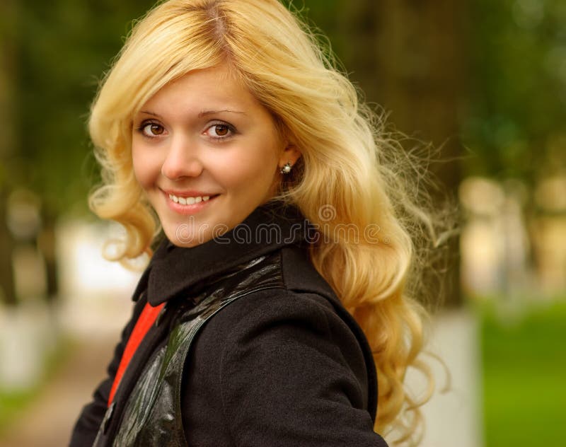Portrait of girl in an even coat royalty free stock photography