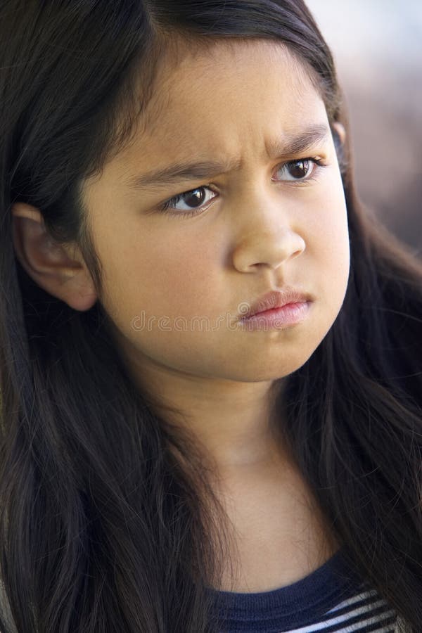 Portrait of Girl Frowning stock photo. Image of black - 7941672