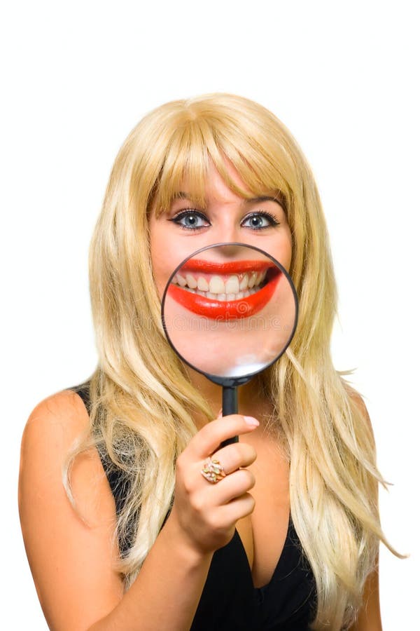 Portrait girl with glass showing tooth