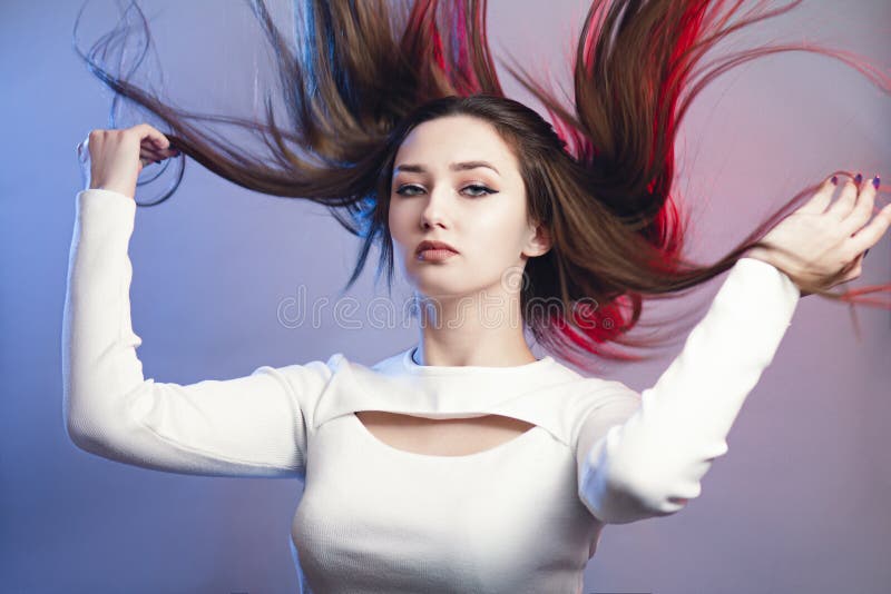 Portrait of Girl with Long Hair Flying in Air on Studio Background, Young  Woman Looking Straight Confidently , Fashion Model, Stock Image - Image of  brunette, background: 175526983