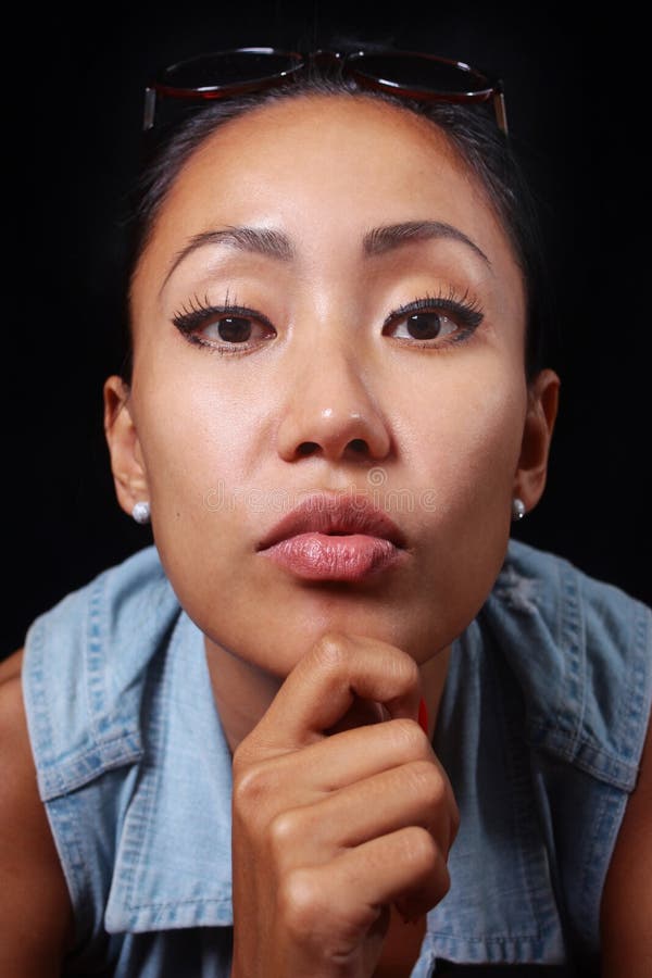 Portrait Of A Girl Looking At The Camera With A Cute Expression On Her Face Stock Image Image 