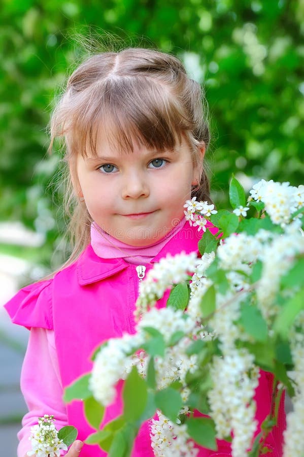 Portrait of a Girl Next To Flowering Tree Stock Image - Image of female ...