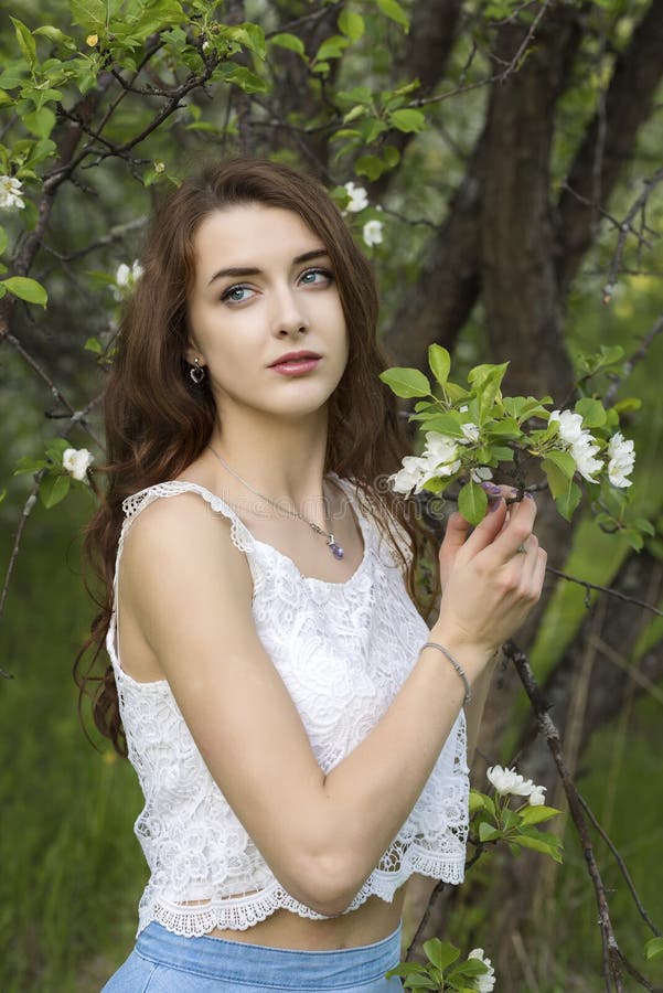 Portrait of a Girl Surrounded by White Blossoming Trees Stock Image ...