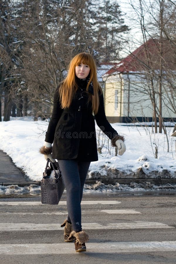 Portrait of a girl walking in park