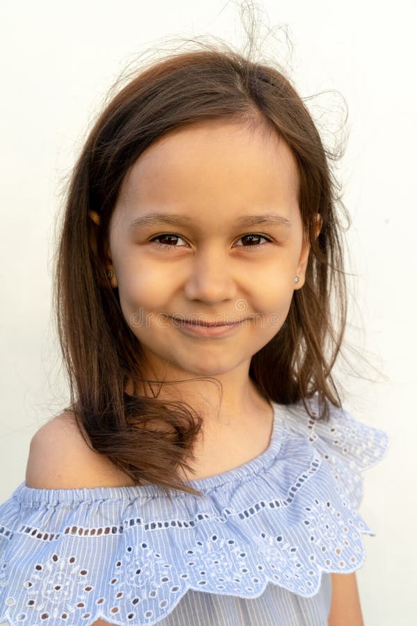 Portrait of a Girl of 7 Years Old with Brown Hair and Brown Eyes in a ...