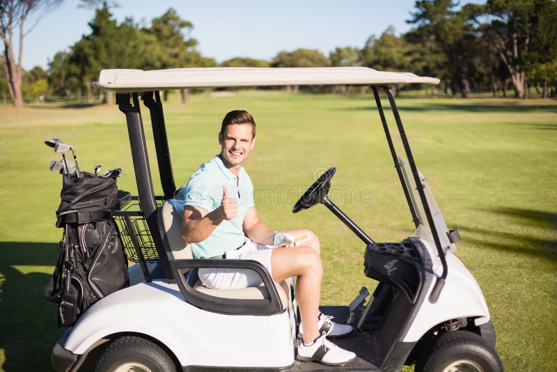 Portrait of golfer man showing thumbs up