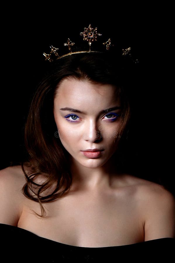 Portrait of a Gorgeous Girl with a Decoration on the Head in the Shape ...