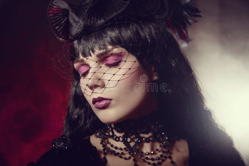 Portrait of gothic girl with artistic makeup