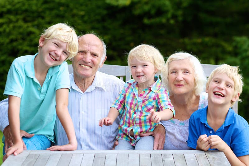 Portrait of grandparents with grandkids