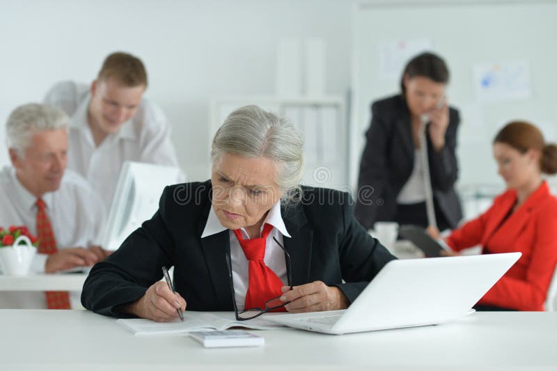 Portrait of group of successful business people. Group of successful business people working in modern office royalty free stock photo Portrait of group of successful business people. Group of successful business people working in modern office royalty free stock photo