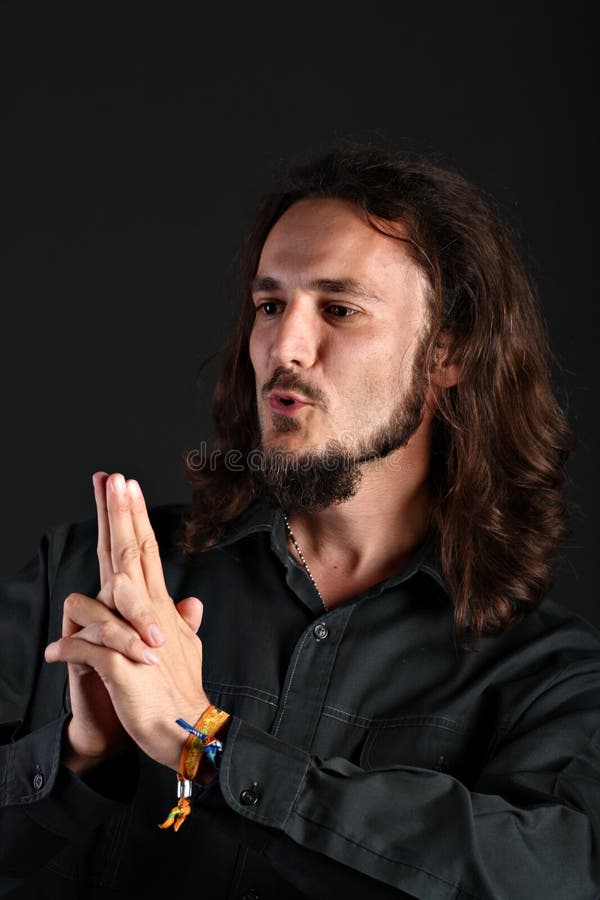 Portrait of guy making finger gun on black backgro royalty free stock images Portrait of guy making finger gun on black backgro royalty free stock images