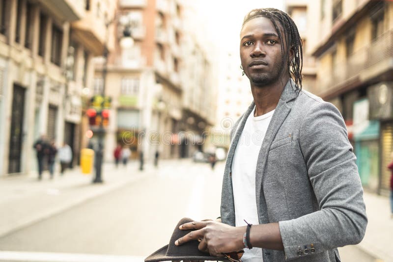 Portrait handsome african american man on the street with serious expression