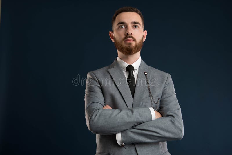 Confident Handsome Constructor Posing with Folded Arms Stock Photo ...