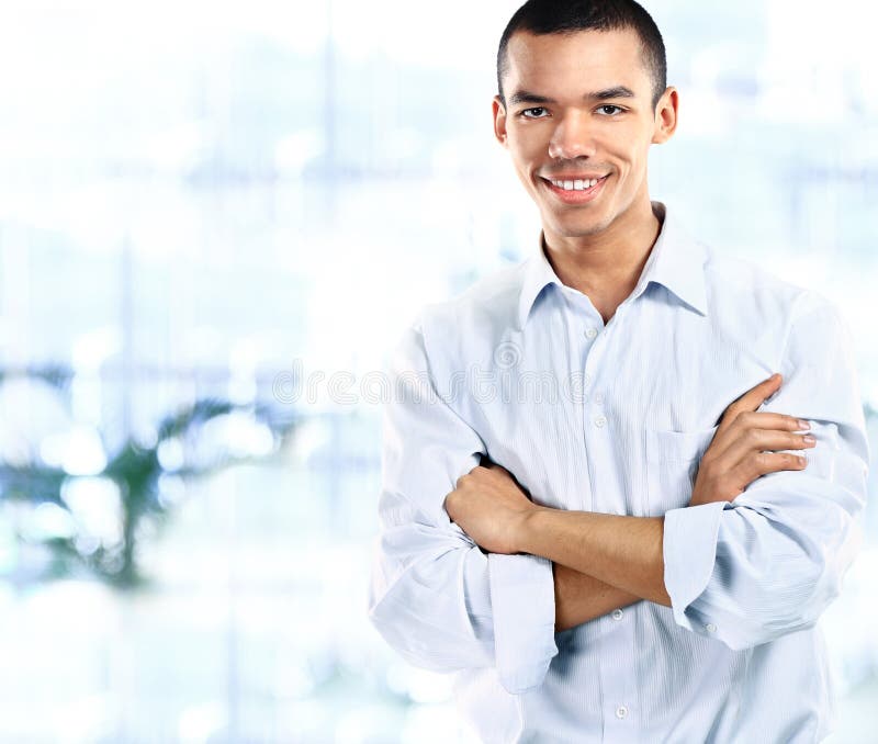 Portrait of handsome confident young african businessman stock photo Portrait of handsome confident young african businessman stock photo