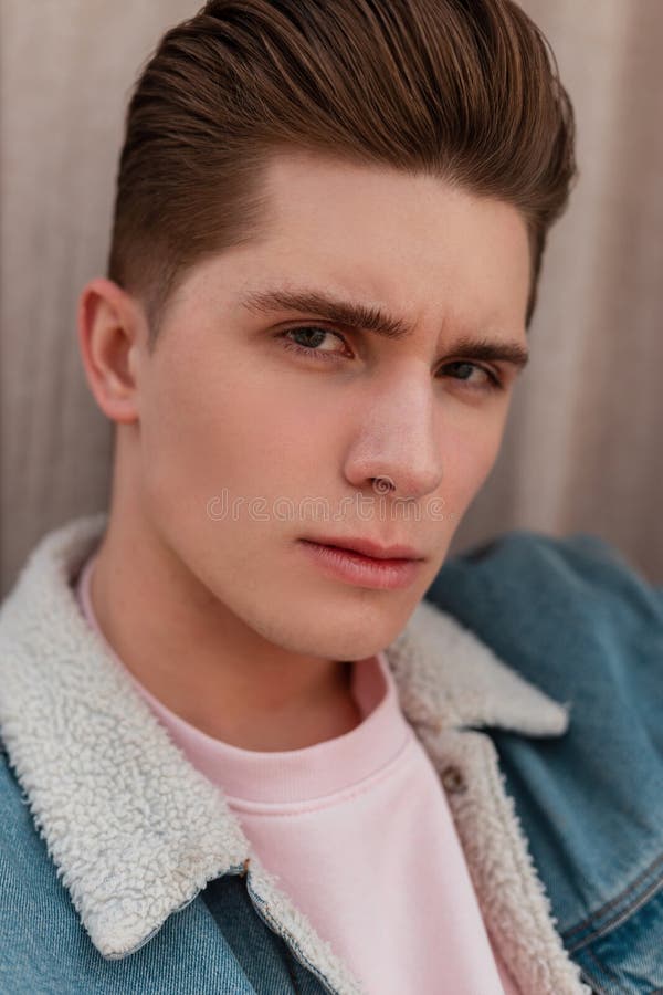 Portrait Handsome Male Serious Face with Clean Healthy Skin with Fashionable  Hairstyle. Stylish Attractive Guy in Blue Denim Stock Image - Image of  clothes, fresh: 238542881