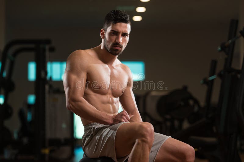 Portrait Of A Handsome Man Resting At Gym. Body, male.