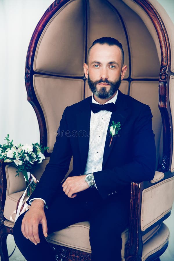 Brooding Groom Waiting for His Bride Sitting in a Chair Stock Image ...