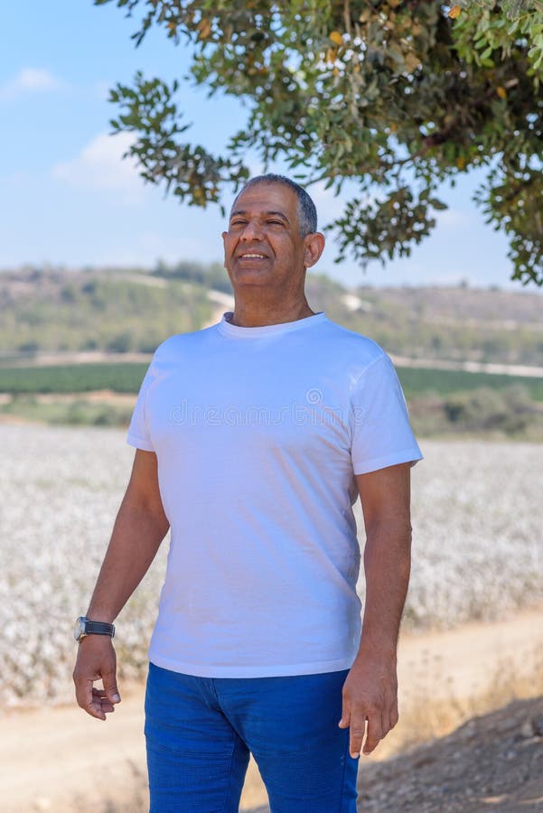 Portrait Of Handsome Old Active Senior Man Outdoors. Sporty athletic elderly businessman on nature background. stock photo Portrait Of Handsome Old Active Senior Man Outdoors. Sporty athletic elderly businessman on nature background. stock photo