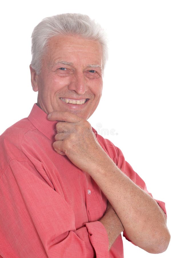 Portrait of handsome senior man wearing pink shirt