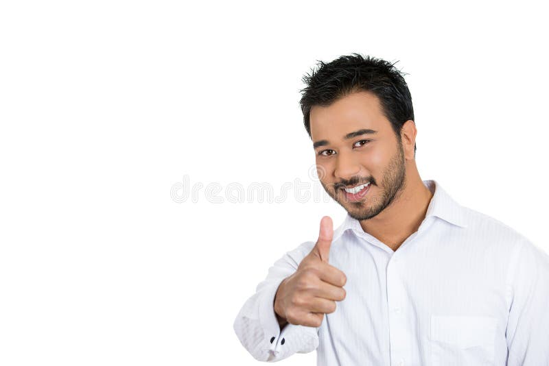 Portrait of handsome young business man, student, employee, customer giving thumbs up sign