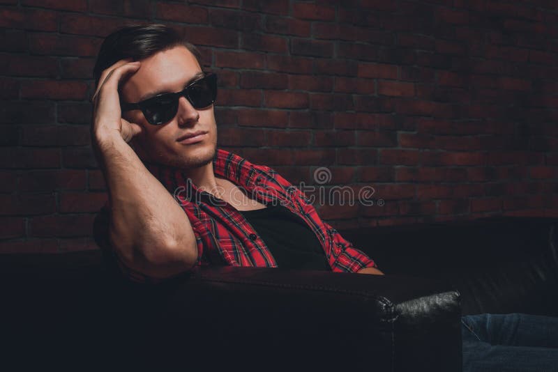 Portrait handsome young hipster man glasses casual