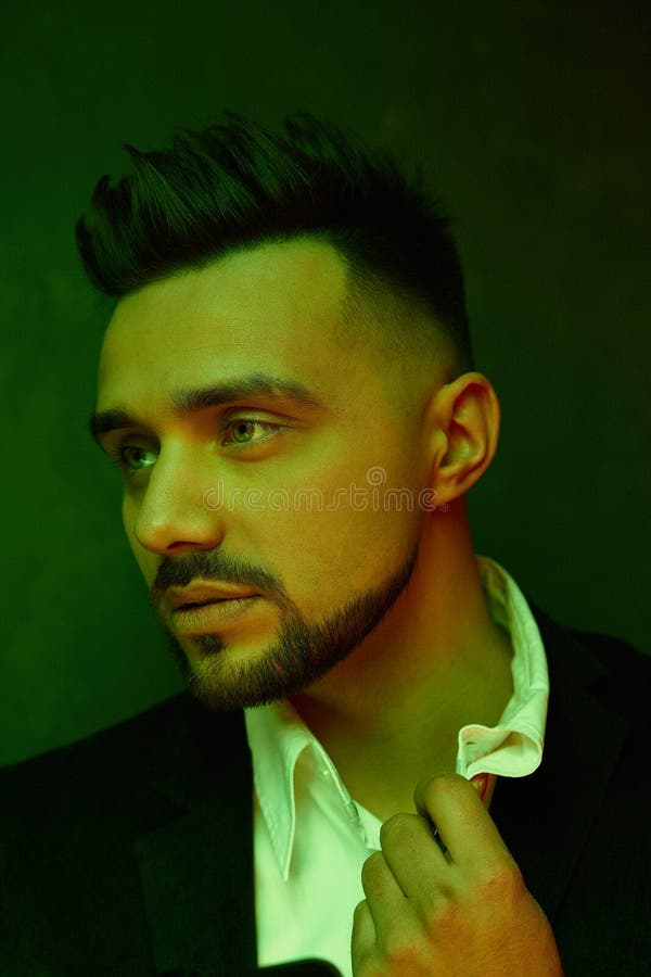 Portrait of Handsome Young Man Against Studio Background. Stock Photo - Image of haircut, hairstyle: 182179918 Portrait of Handsome Young Man Against Studio Background. Stock Photo - Image of haircut, hairstyle: 182179918