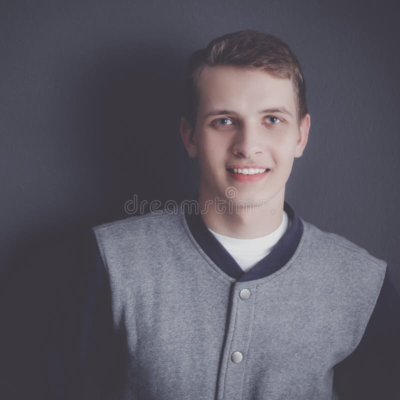 Portrait of a Handsome Young Man on Black Background Stock Image