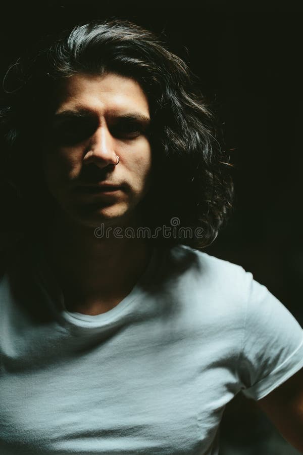 Portrait of a Handsome Young Man with Long Hair Stock Image - Image of ...