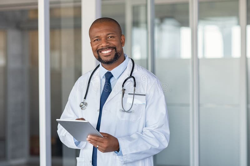 Portrait Of Happy African Doctor At Private Clinic Stock Image Image