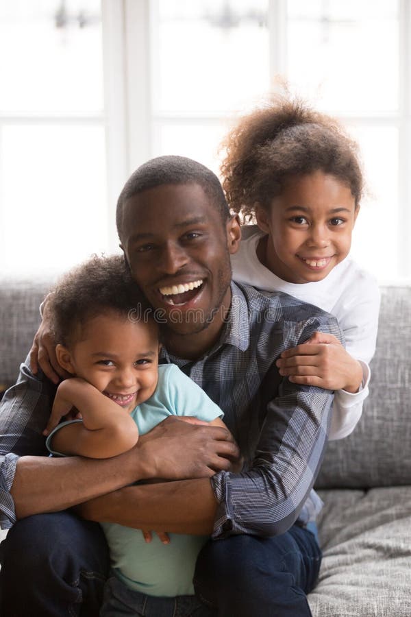 Cheerful african american father giving son piggyback ride outdoors  smiling, Happiness family concepts 6774671 Stock Photo at Vecteezy