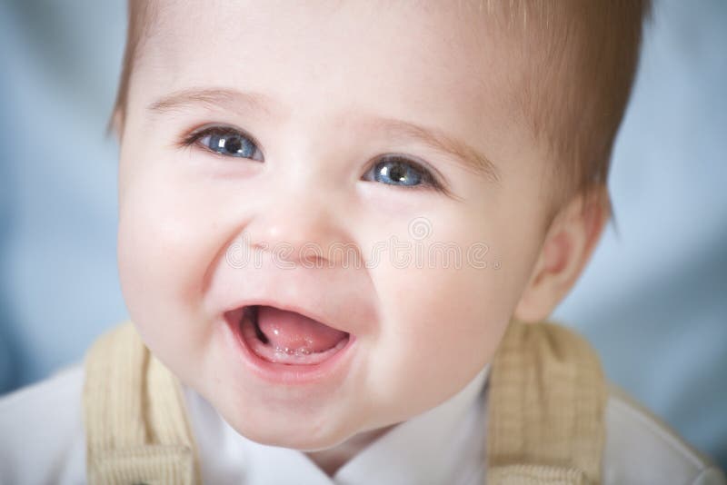 Portrait of happy blue-eyes baby