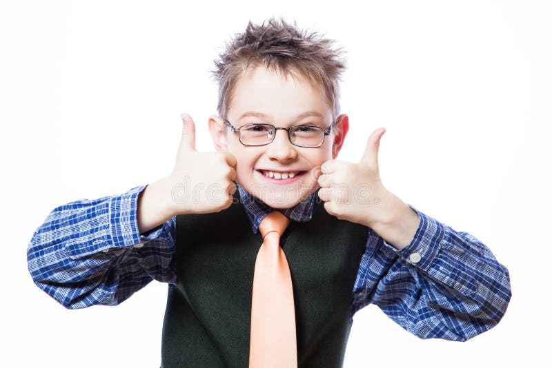 Portrait of happy boy showing thumbs up