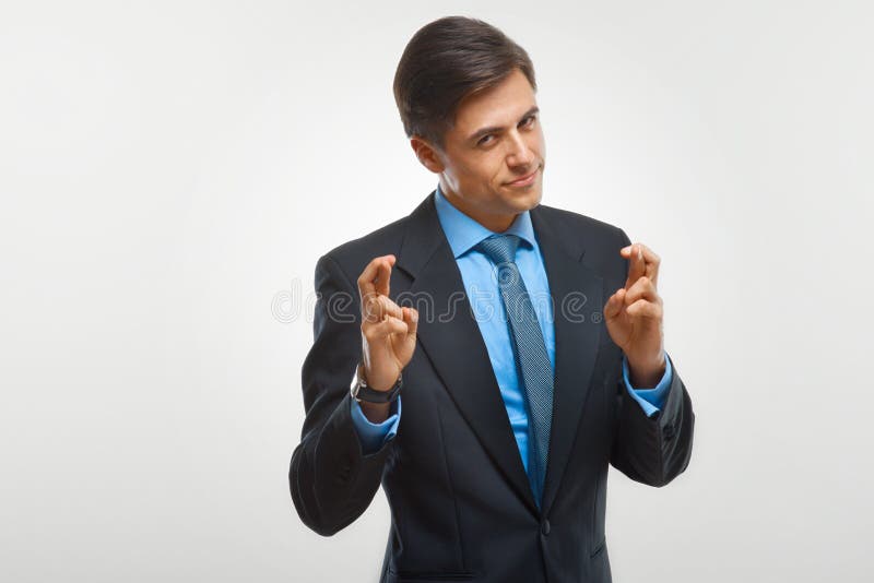 Portrait of happy businessman against white background stock photos