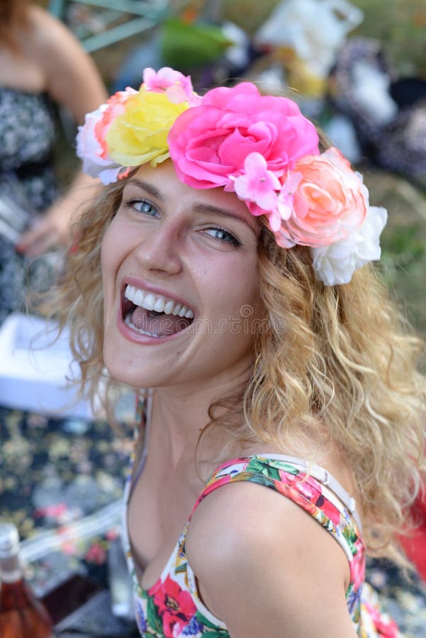 Portrait of happy cheerful beautiful young woman, outdoors