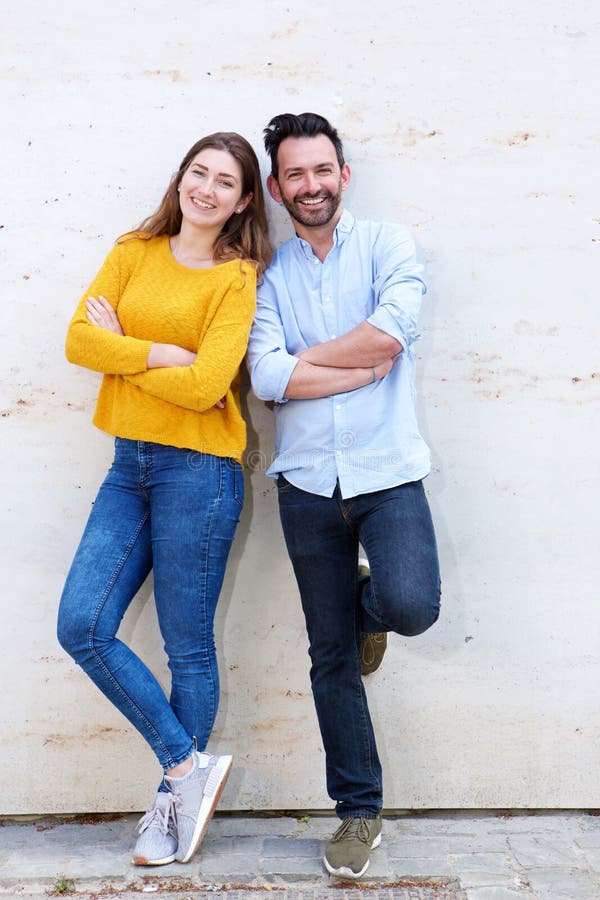 Cute couple standing in romantic hi-res stock photography and images - Alamy