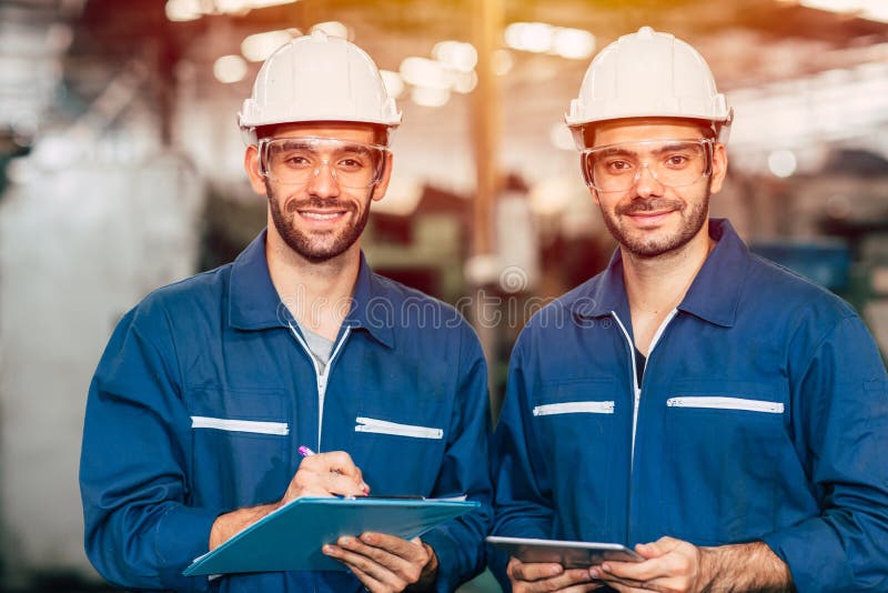 Portrait of happy engineer teamwork smiling looking at camera stock photos