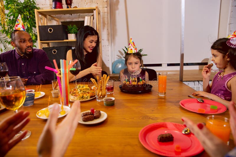 Portrait of Happy Family Celebrating a Birthday at Home Stock Photo