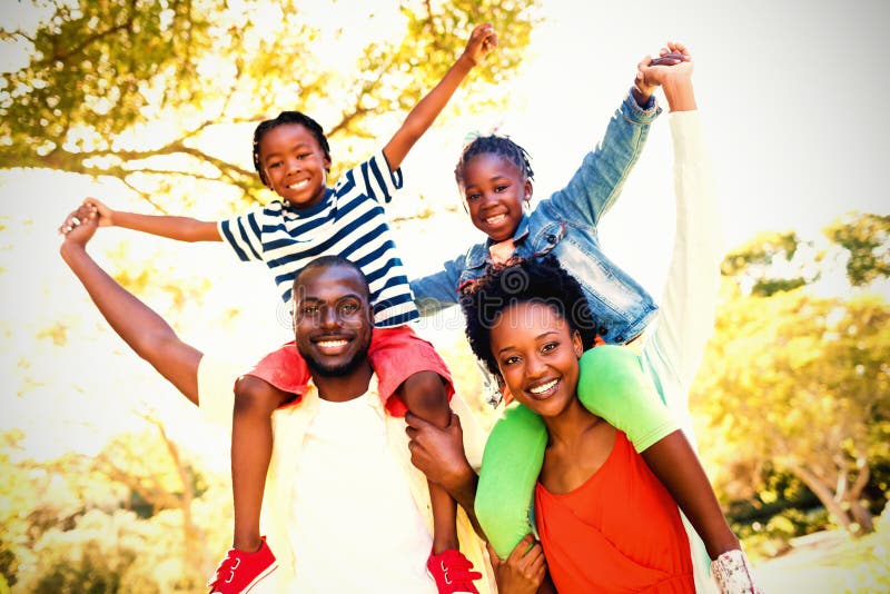 Portrait of happy family enjoying at park royalty free stock photo Portrait of happy family enjoying at park royalty free stock photo