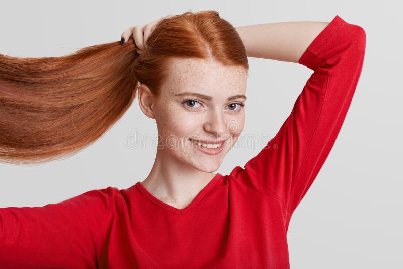Portrait of Happy Redhead Pretty Young Woman Demonstrates Her Luxurious  Long Hair, Makes Pony Tail, Going To Have Walk with Friend Stock Photo -  Image of portrait, lifestyle: 106908608